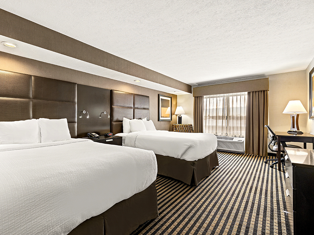 Double queen guest room at Sonesta Essential Indianapolis Airport